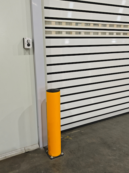 Flexible collision protection post for industrial facilities